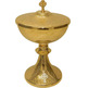 Golden metal ciborium with silver Cross