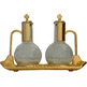 Glass and metal cruets golden color color